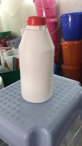 plastic bottle milk white one litre